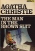 The man in the brown suit