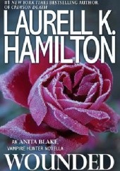 Okładka książki Wounded Laurell K. Hamilton